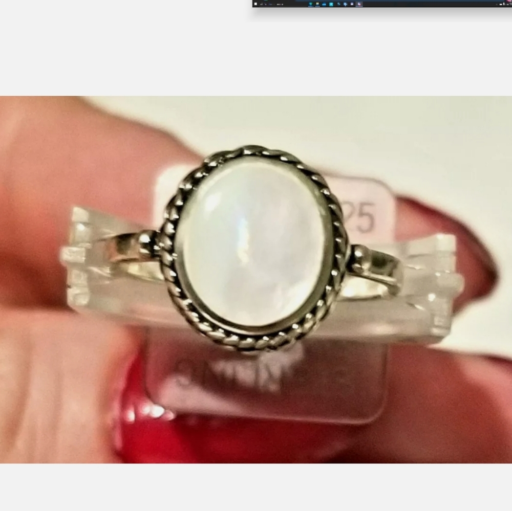 STERLING SILVER MOTHER OF PEARL SHELL RING
ETCHED